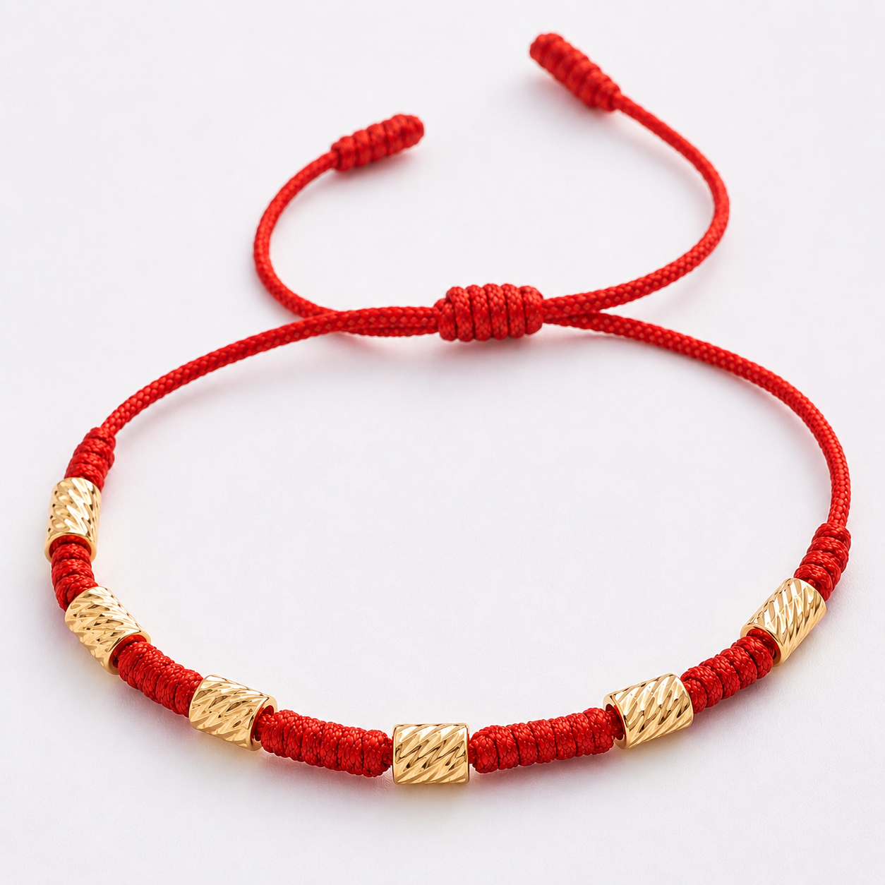 Pulsera de los 7 Nudos en Cilindros Oro 18k