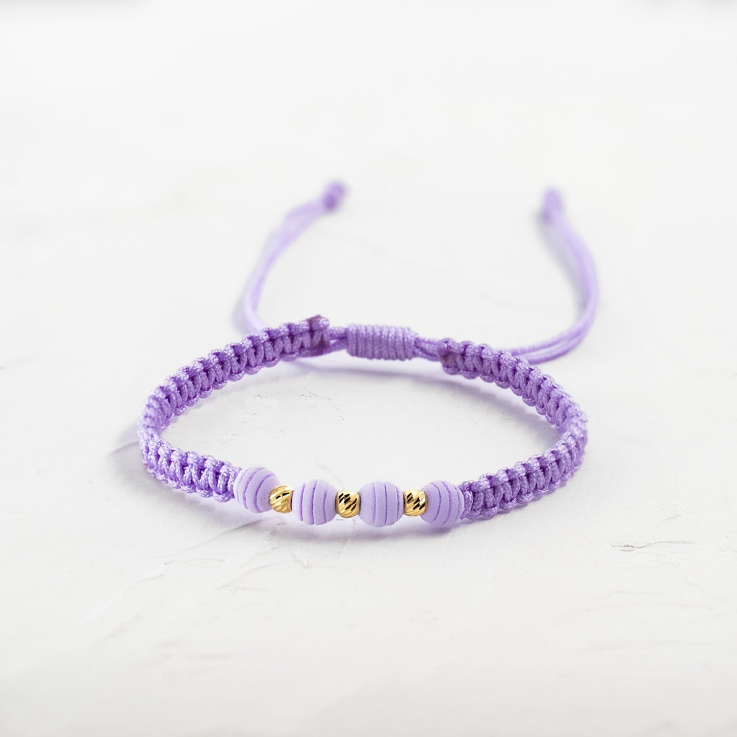 Pulsera Trenzada Morada con Balines Diamantados 18k