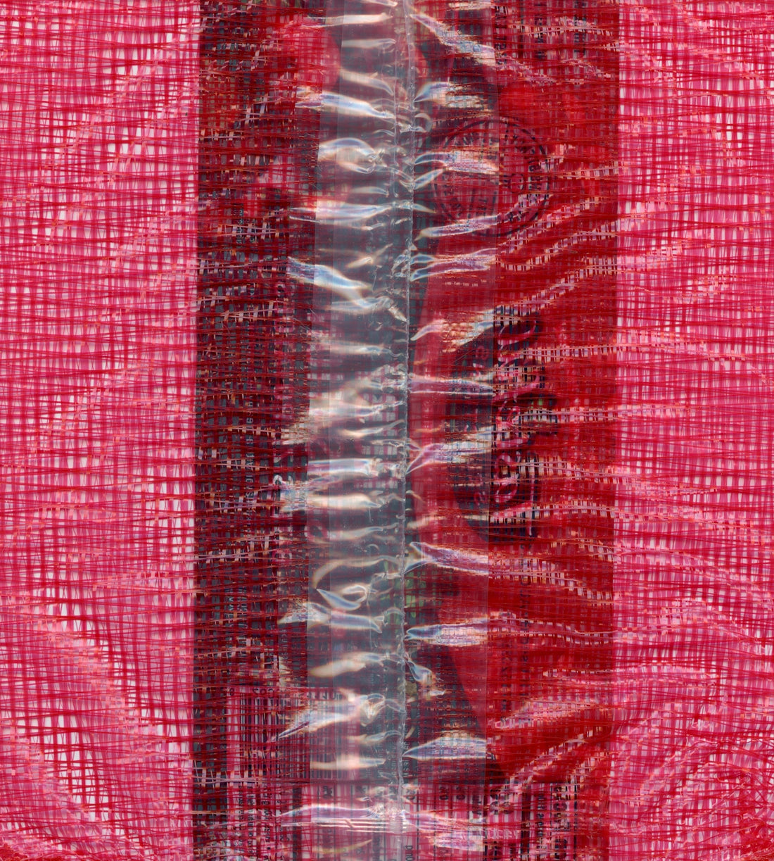a piece of red fabric with a black and white stripe