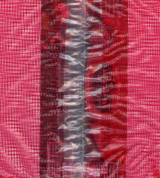 a piece of red fabric with a black and white stripe