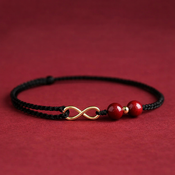 Pulsera Prosperidad Infinito Oro 18k y Piedra Cinabrio