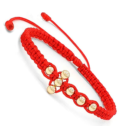 Pulsera cruz balines en Oro 18k Rojo